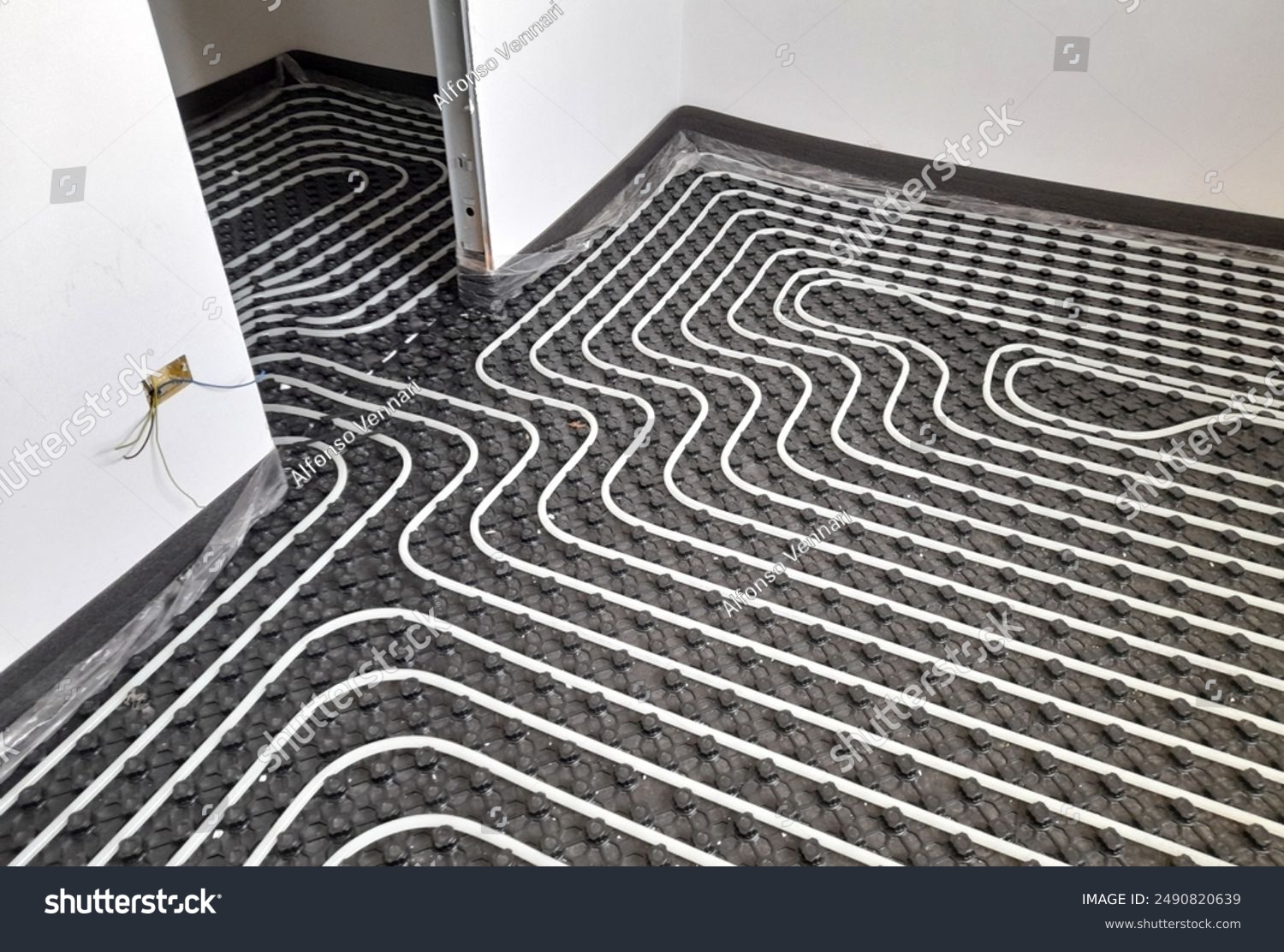 stock-photo-radiant-floor-heating-and-cooling-system-2490820639